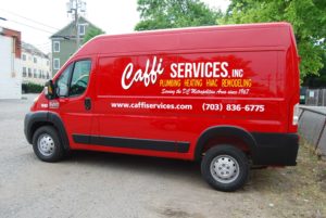 A red Caffi Services company van.