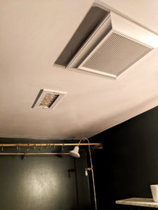 Bathroom vents in updated bathroom.