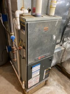 Old gas furnace that needs replacement