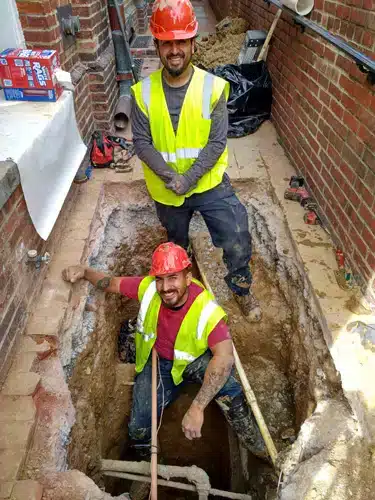 Caffi Services employees working construction on a home.